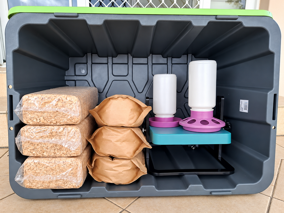 Hatching Chicks Brooder Kit: 100 L tub with three bags of sawdust bedding, three bags of chick starter, a drinker, a feeder and a brooder plate